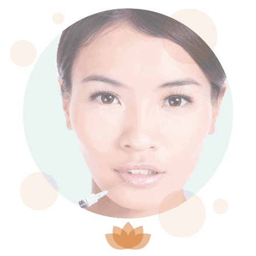 Portrait of an Asian woman with serene expression and lotus flower