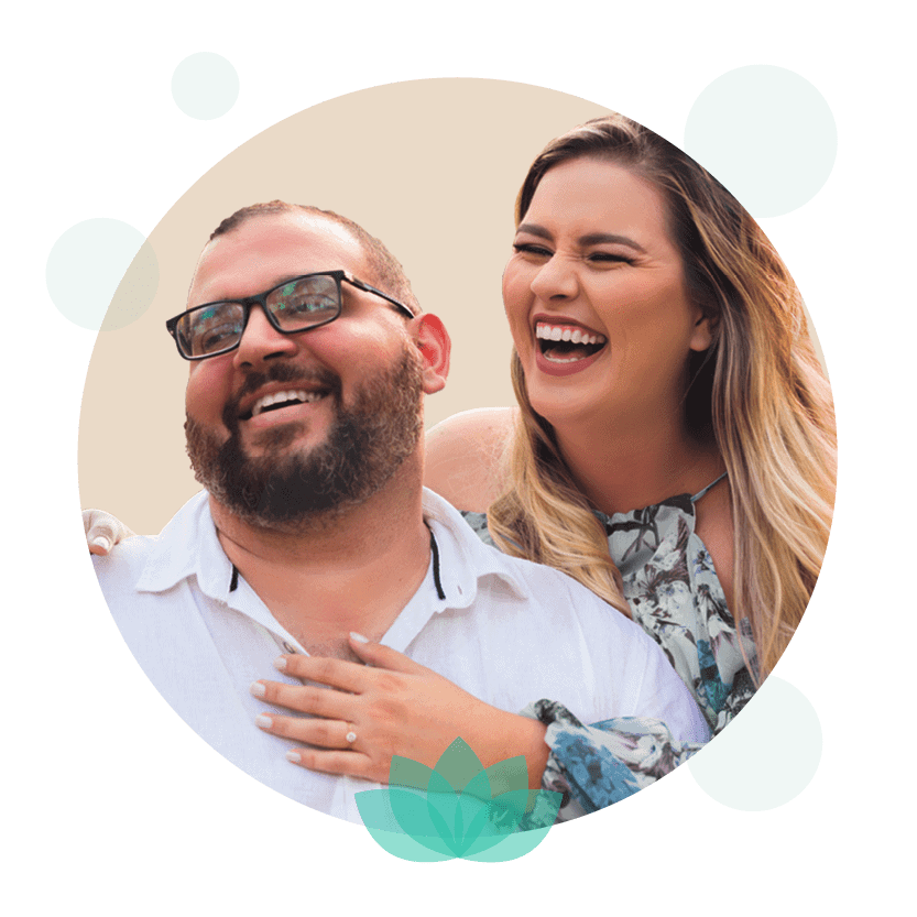 Smiling couple laughing together in circular portrait