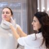 Best Facial Treatment Dermatologist examining patient's face in clinical setting