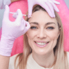 Anti-Wrinkle Injections Woman receiving botox injection from medical professional